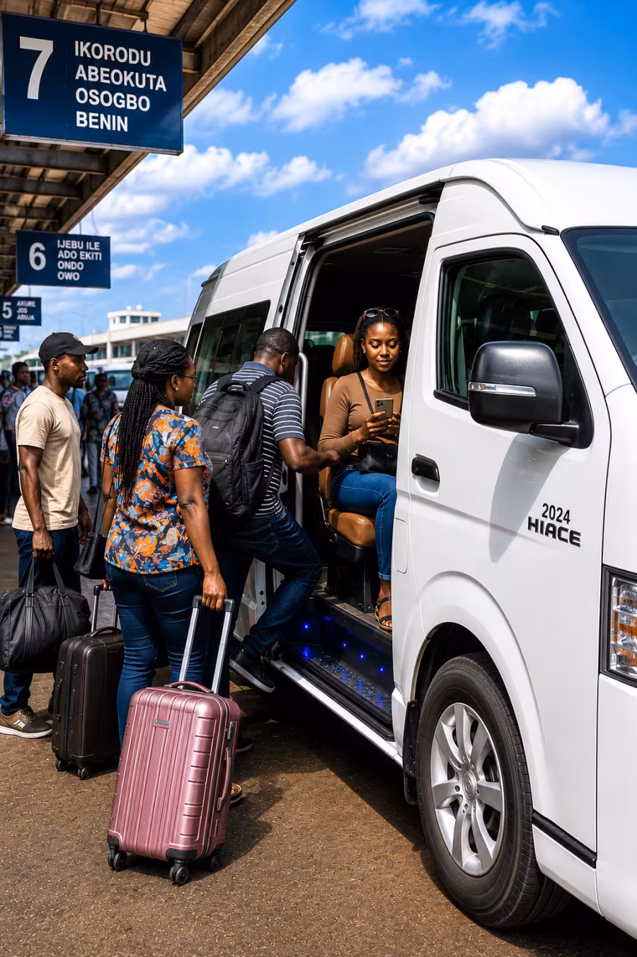 Passengers boarding an intercity van at a transport terminal